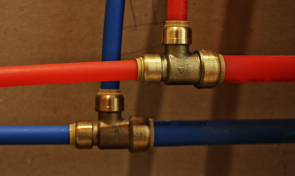 Sharkbite Fittings With Red And Blue Pex Pipe.